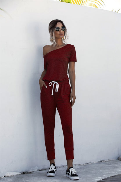 Off-the-shoulder jumpsuit with diagonal shoulders - Fabric of Cultures