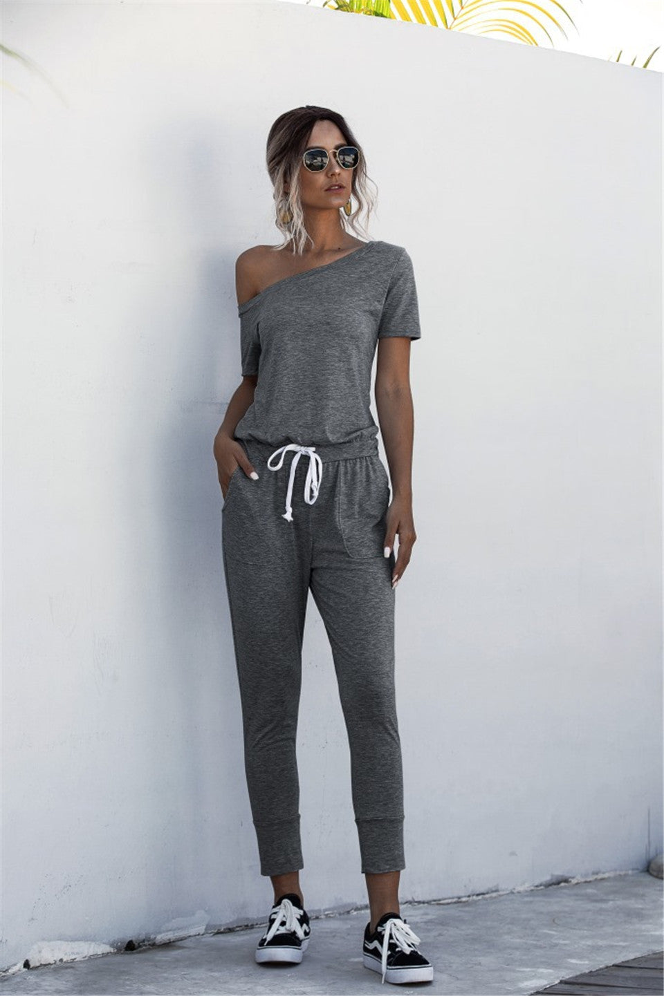 Off-the-shoulder jumpsuit with diagonal shoulders - Fabric of Cultures